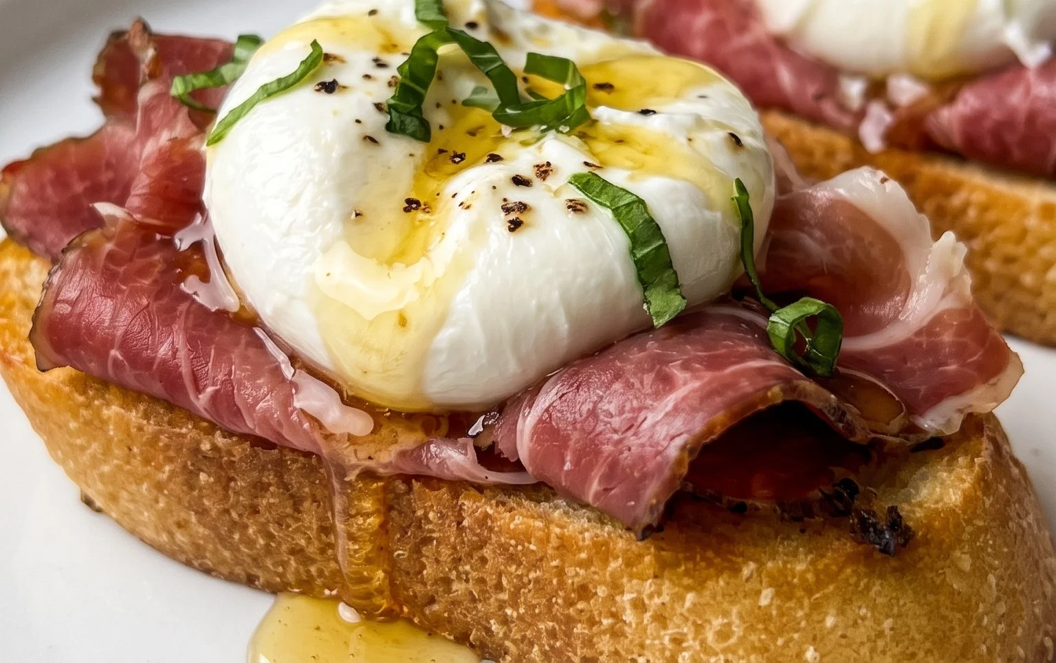 Beef Prosciutto Crostini with Burrata and Lemon Honey Drizzle